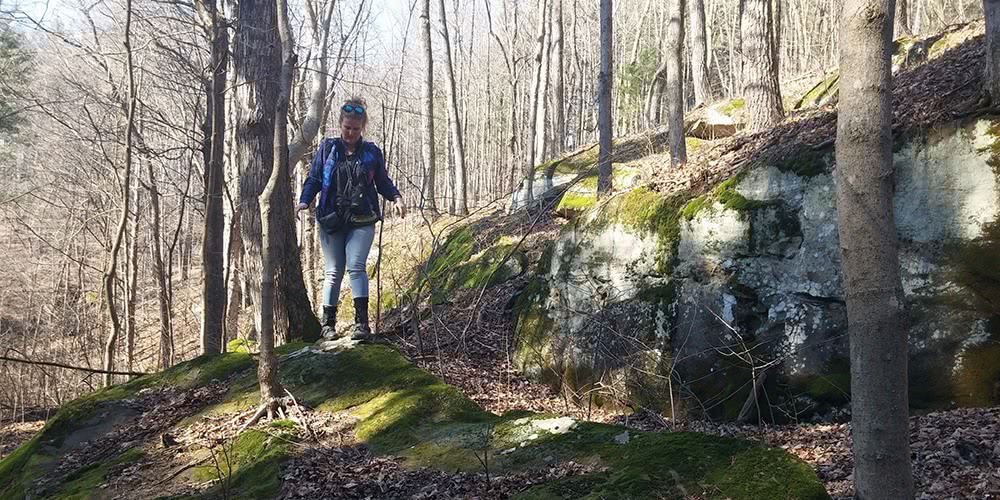 Heather hiking a ridge in the Hocking Hills.